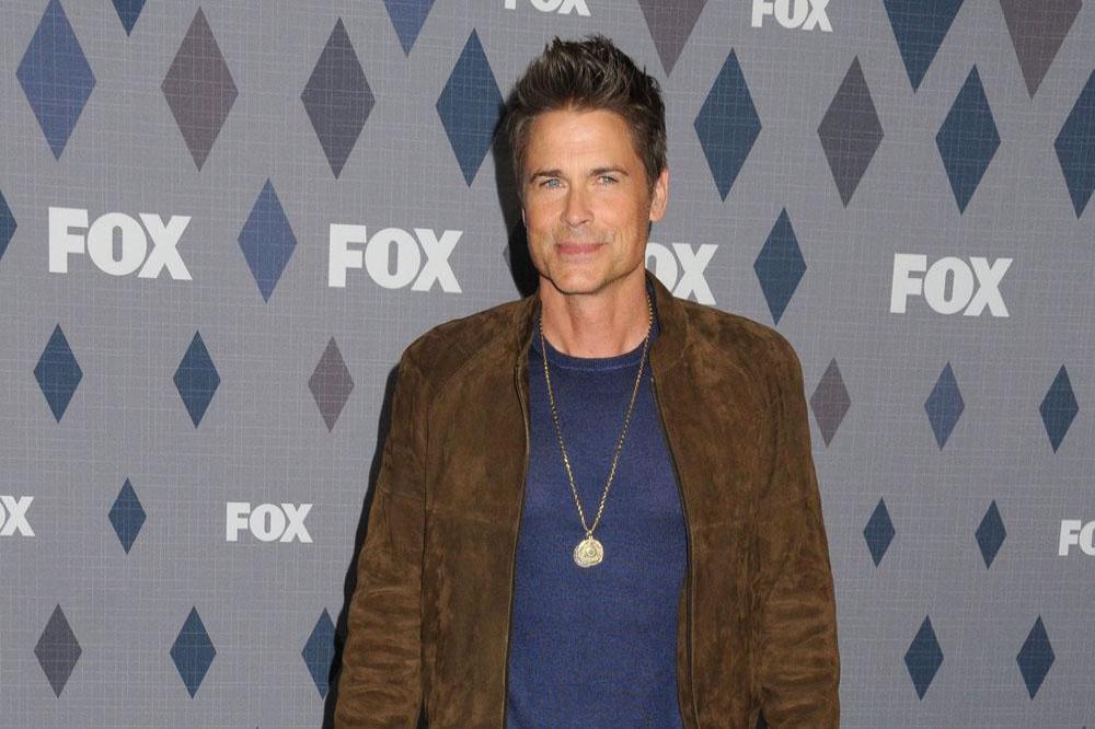 Rob Lowe claims he talked to a ghost and revealed his pal Charlie Sheen bel...