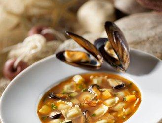Soup with mussels and ravioli